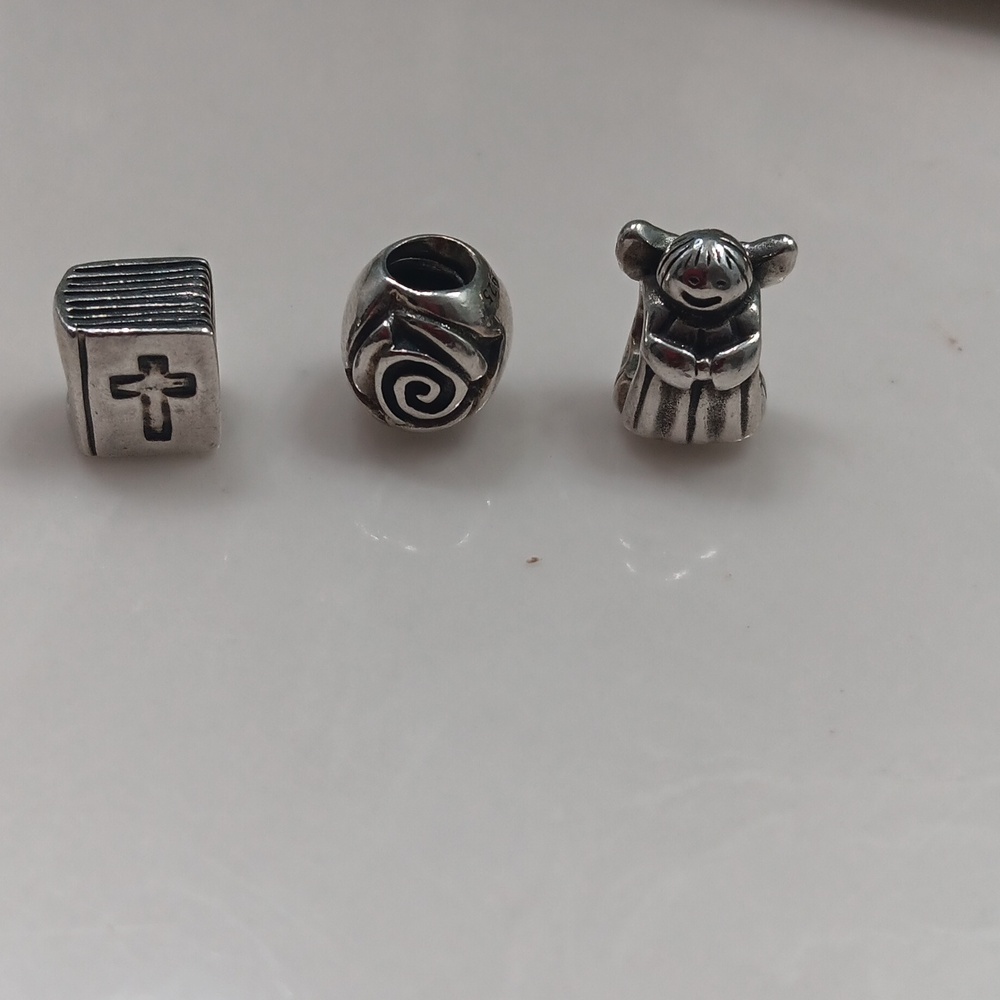 Set of three Pandora sterling silver  charms